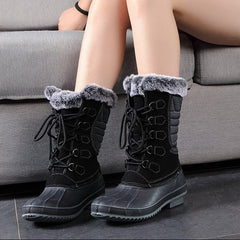 Black lace-up snow boots with faux-fur lining and grippy rubber outsole