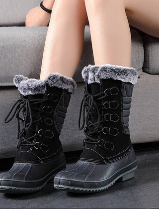 Black lace-up snow boots with faux-fur lining and grippy rubber outsole