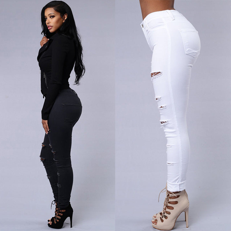 Distressed high waist skinny jeans for women, featuring a trendy ripped denim look and flattering pencil cut.