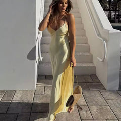 Elegant women's slip maxi dress, flowing fabric for evening wear or special occasions.