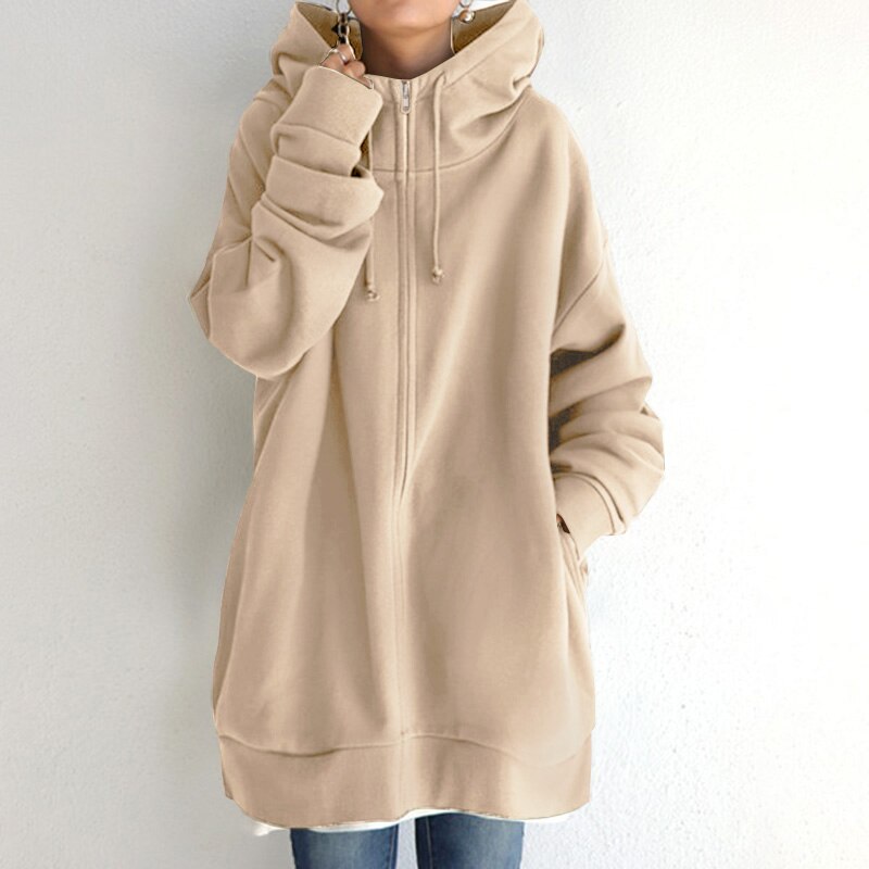 Close-up of soft fabric on a women's cozy oversized hoodie, ideal for ultimate winter warmth and comfort wear.