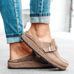 Casual women's clogs with ergonomic design, comfortable cork sole, and slip-on convenience.