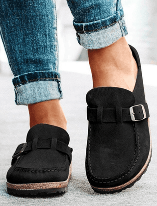 Everyday women's slip-on flats; ergonomic clogs with a supportive cork sole for ultimate comfort.