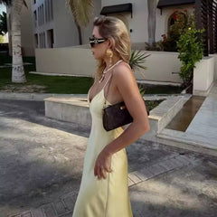 Flowing elegant women's slip maxi dress, a chic and versatile long dress for evening or special occasions.