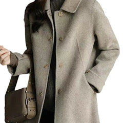 Sophisticated women's coat with an iconic Peter Pan collar & useful pockets, a must-have for elegant autumn style.