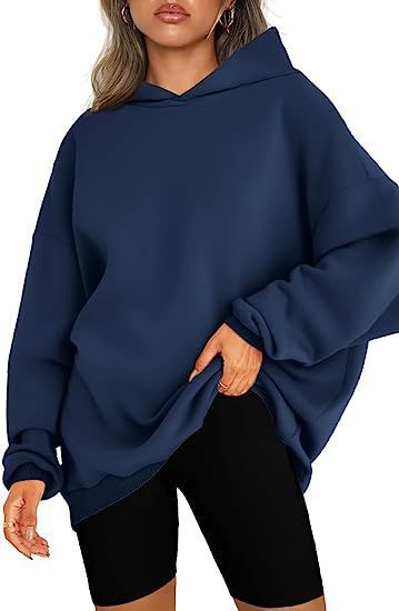 Fashionable women's oversized hoodie, perfect for stylish casual wear & coziness.