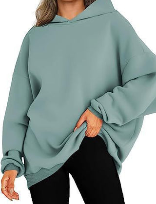 Warm & comfortable women's oversized hoodie, perfect for chilly fall and winter days.