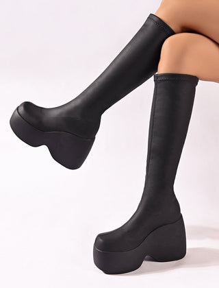 Fashionable women's black platform boots, high-performance & ergonomic for ultimate comfort and style.