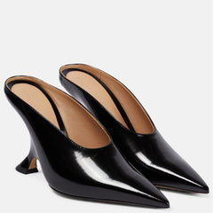 Fashionable women's comfortable metallic wedge mules with a pointed toe and modern sculpted heel design.