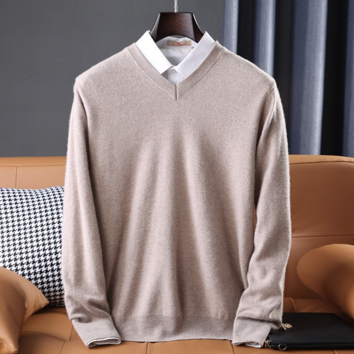 Cozy women's V-neck pullover sweater with a soft knit texture. Long-sleeve versatile top for winter fashion.