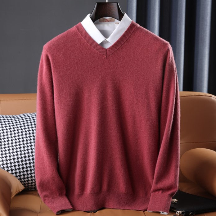 Flattering women's V-neck pullover sweater with long sleeves. Versatile style for casual wear, soft knitwear comfort.