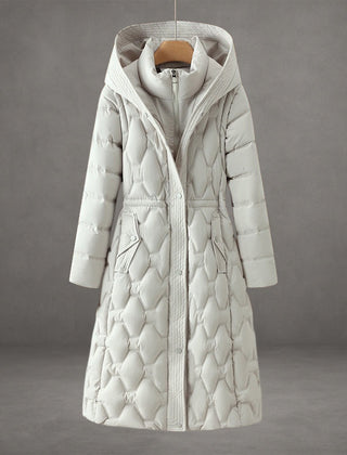 Women's long quilted winter coat, a stylish and warm puffer jacket with a practical hood.