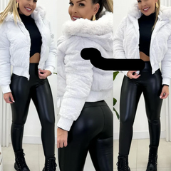 Elegant women's quilted bomber jacket, complete with a plush faux fur hood, for trendy cold weather style.