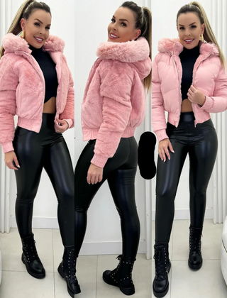 Warm women's quilted bomber jacket featuring a cozy faux fur hood, ideal for cold weather outerwear.
