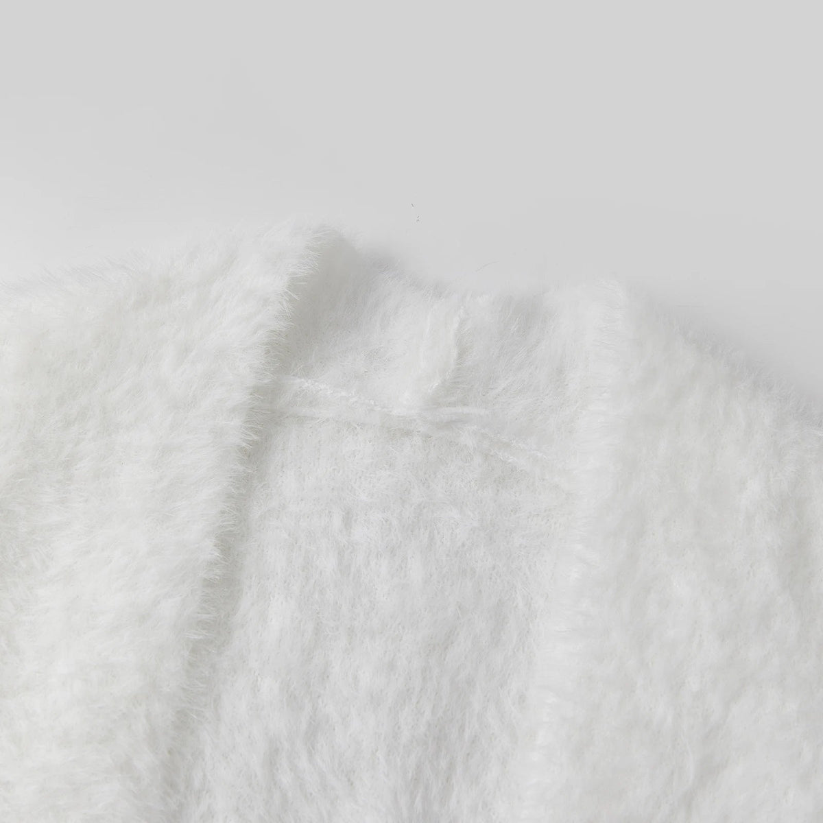 Women's loose fit white long cardigan with open front, cozy for fall fashion & winter style.