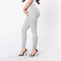 Elegant women's high waist skinny jeans, perfect for smart casual office wear. Versatile denim bottom.