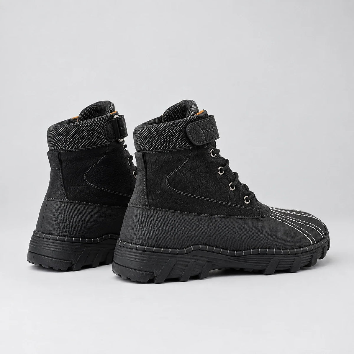 Broden Leather Duck Boots — Black (mens shoe angle)