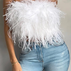 Stylish women's crop top with feather trim, a trendy sleeveless party top.