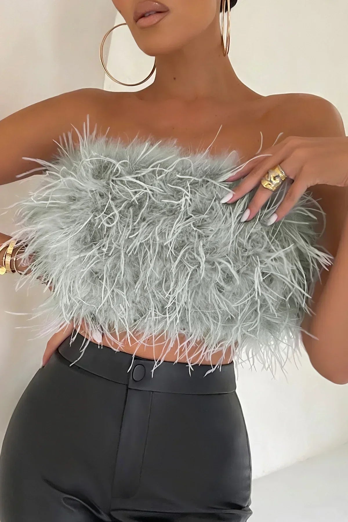 Women's stylish feather-trim tube top, a trendy crop top for elegant party wear.