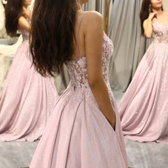 Sparkling embellished maxi dress in light pink, an elegant choice for women attending weddings or special occasions.