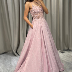 Sophisticated light pink embellished maxi dress for women, a beautiful evening gown or formal wedding guest attire.