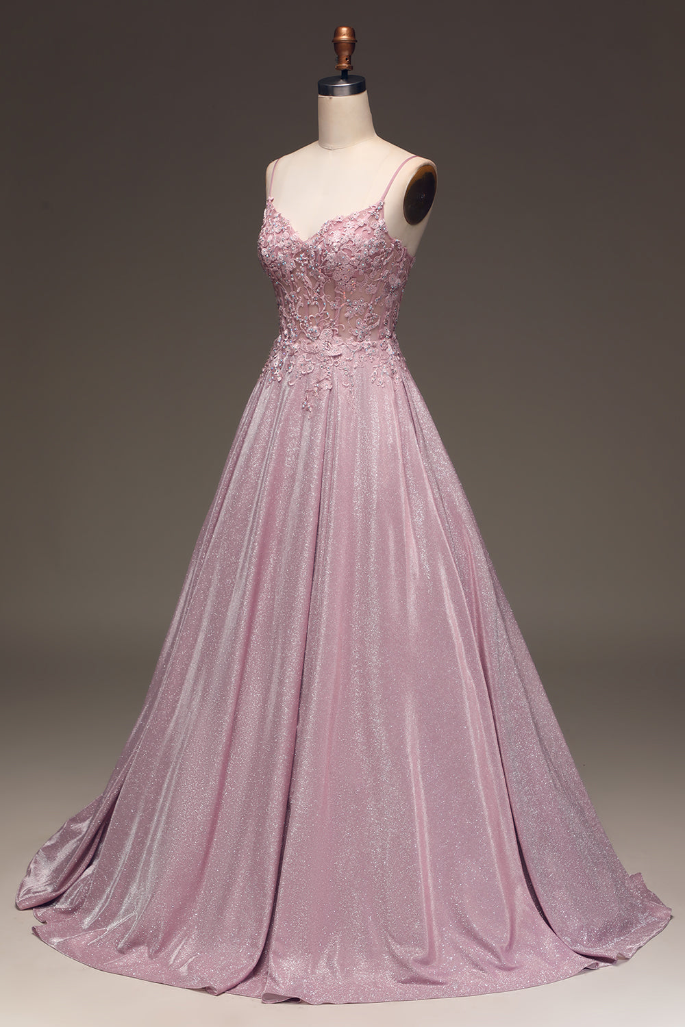 Women's elegant embellished light pink maxi dress, a gorgeous special occasion or formal wedding guest outfit.