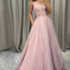 Elegant light pink embellished maxi dress for women, perfect as a wedding guest or formal evening gown.