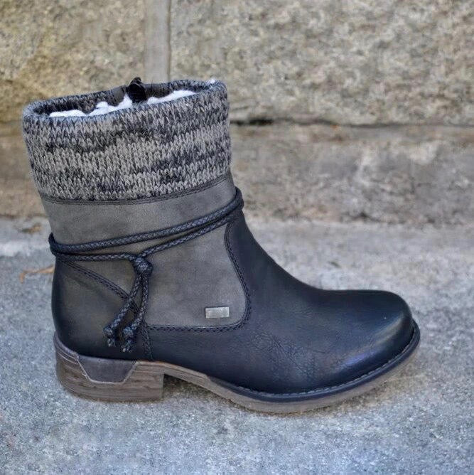 Black women's warm boots with orthopedic comfort. Supportive ankle boots ideal for cozy winter wear and everyday foot support.